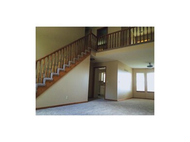 Beautiful staircase and loft area.