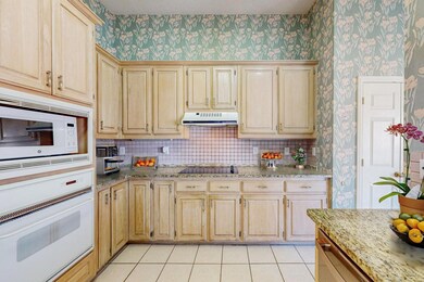 A stylish kitchen with plenty of cabinets, providi