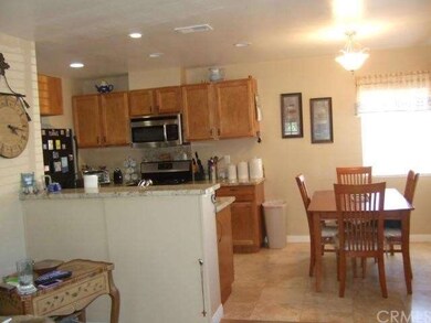 Front house nice sized living room with pergo floo