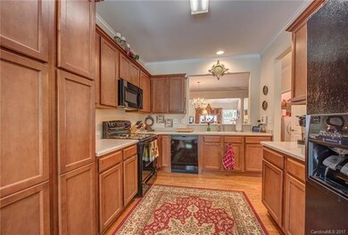 Kitchen with opening looking into dining room