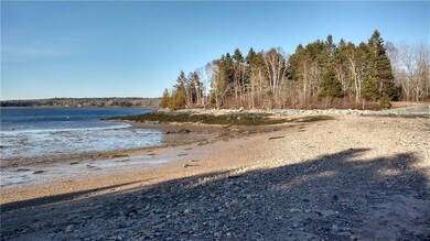 Sandy, pebbly beach with public...