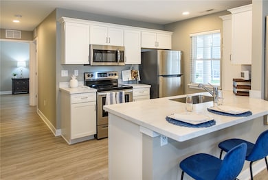 Typical kitchen in Lehigh Park Phase II with stain