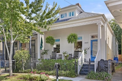Fenced front yard and lovely porch