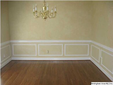 FORMAL DINING ROOM WITH NEW HARDWOOD FLOORS AND SH