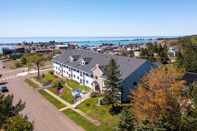 View from above of property with a large body of water