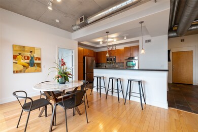 Combined kitchen and dining area with abundant amo