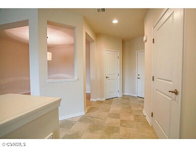 Foyer - The tile flooring in the entryway is an up