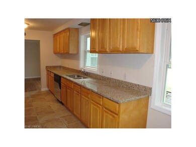GRANITE COUNTERTOPS.LOTS OF CABINETS..  LARGE CERA