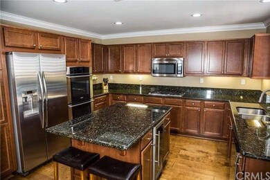Stainless steel appliances including wine frig in 