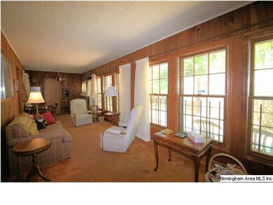 Large den across back of home