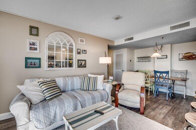 Living room featuring dark hardwood / wood-style f
