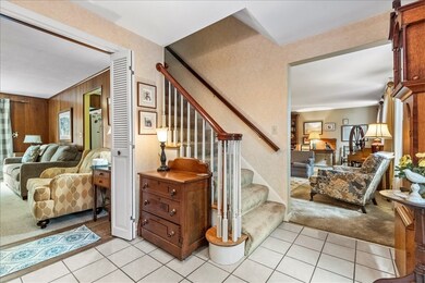 Leading to either the formal living room or family