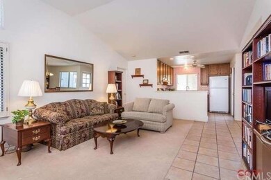 Living area adjacent to kitchen.