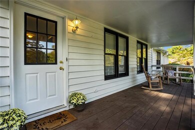 Large front porch to enjoy early summer mornings and cool fall evenings!