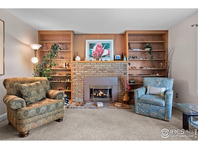 The first of three gathering rooms; the stone fireplace is the perfect spot in the midst of Winter