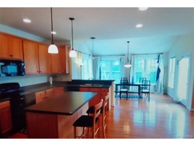 GLEAMING WOOD FLOORS OPEN INTO LARGE COMBINATION K