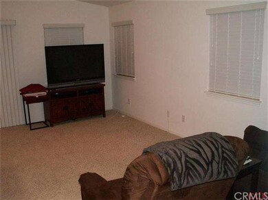 Living room is in the open design of the kitchen a