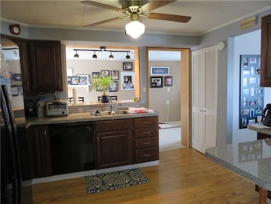 Open kitchen to family room with laminate flooring