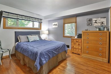 Bedroom #1 with two windows and two closets with o