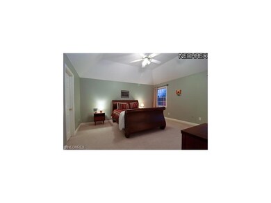 Master bedroom with tray ceiling, walk in closets,