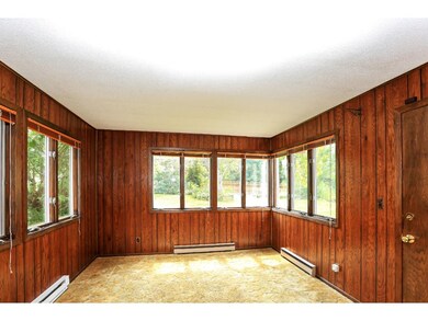 The Sunroom has windows galore!