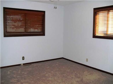 Master bedroom is spacious and offers two windows 