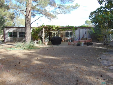 Back of property with a patio area