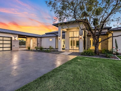 Contemporary house with a standing seam roof, stuc