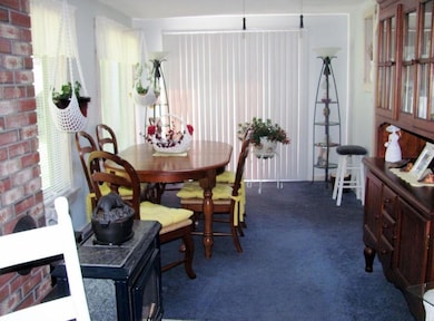 Sunroom with heat stove