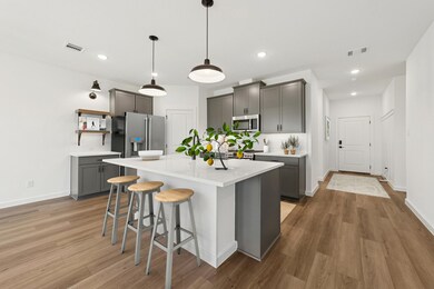 Kitchen with stylish floating shelves