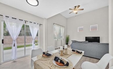 Dining space with light wood-style flooring and a