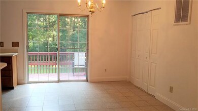 Leading from the great room is a large, open dinin