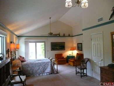 The master suite has cathedral ceilings, two large