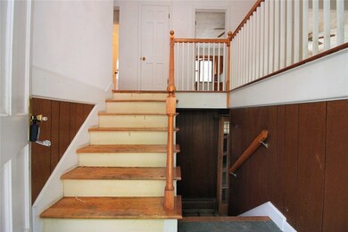 Traditional split foyer entryway.