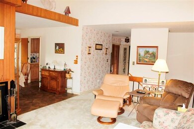 View of living room toward entry
