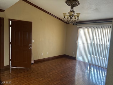 Spacious living room  with wood finished floors, b