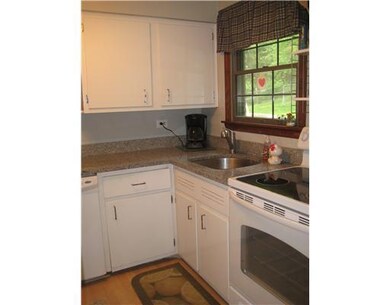 Kitchen. Charming white kitchen with newer applian