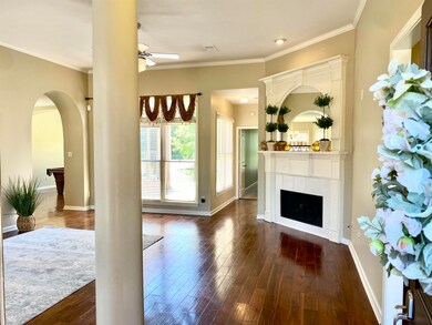 Living room with dark hardwood / wood-style floors