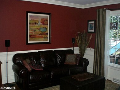 Living Room - Hardwoods, wainscoting, and crown mo