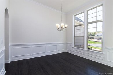 Dining room with HUGE windows!   -representative p