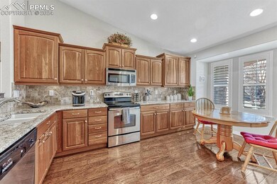 Kitchen featuring dark hardwood / wood-style floor