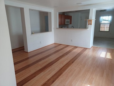 living room with laminate wood flooring