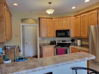 Kitchen with appliances with stainless steel finis