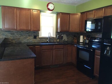 Kitchen with breakfast bar.