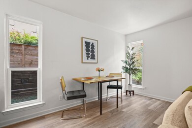 With plenty of room to create your ideal dining setup, this living area effortlessly combines both lounging and dining spaces. It’s perfect for those who love an open, flexible layout where everything flows together seamlessly