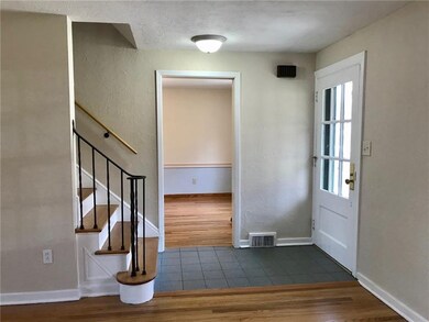 Entry has tile to keep clean