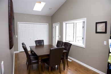 Vaulted dining room adjacent to Kitchen. Bay windo