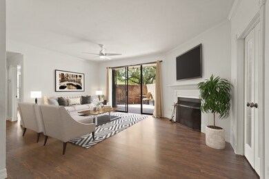 This living room features a gorgeous fireplace wit