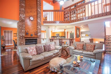 Commanding Two-Story Living Area, Dining Area, And