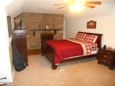 Bedroom with fireplace